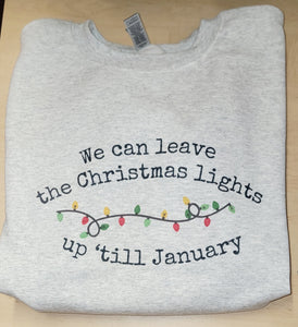 We can leave the Christmas lights on till January....Sweatshirt