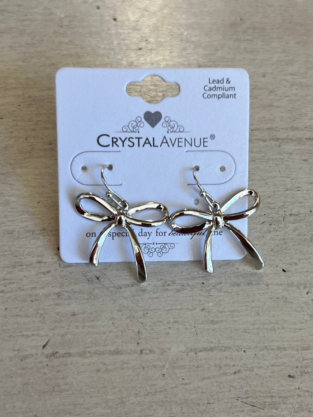 Silver Bow Dangle Earrings