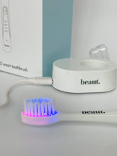 Load image into Gallery viewer, Beaut. Smile Kleen Sonic LED Smart Toothbrush
