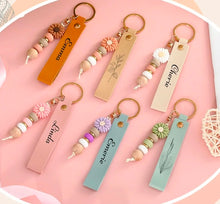 Load image into Gallery viewer, Engraved PU Leather Flower Bead Keychain
