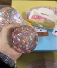 Load image into Gallery viewer, Transparent Glitter Dumpling Squishy Arriving May 12thish
