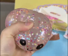 Load image into Gallery viewer, Transparent Glitter Dumpling Squishy Arriving May 12thish
